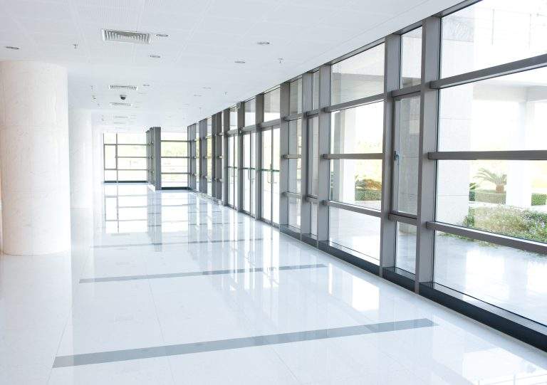 empty long corridor in the modern office building.